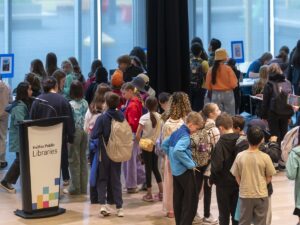 Crowd of students lines up at autograph tables to see the five authors at the Hackmatack 2026 ceremony at Paul O'Regan Hall.